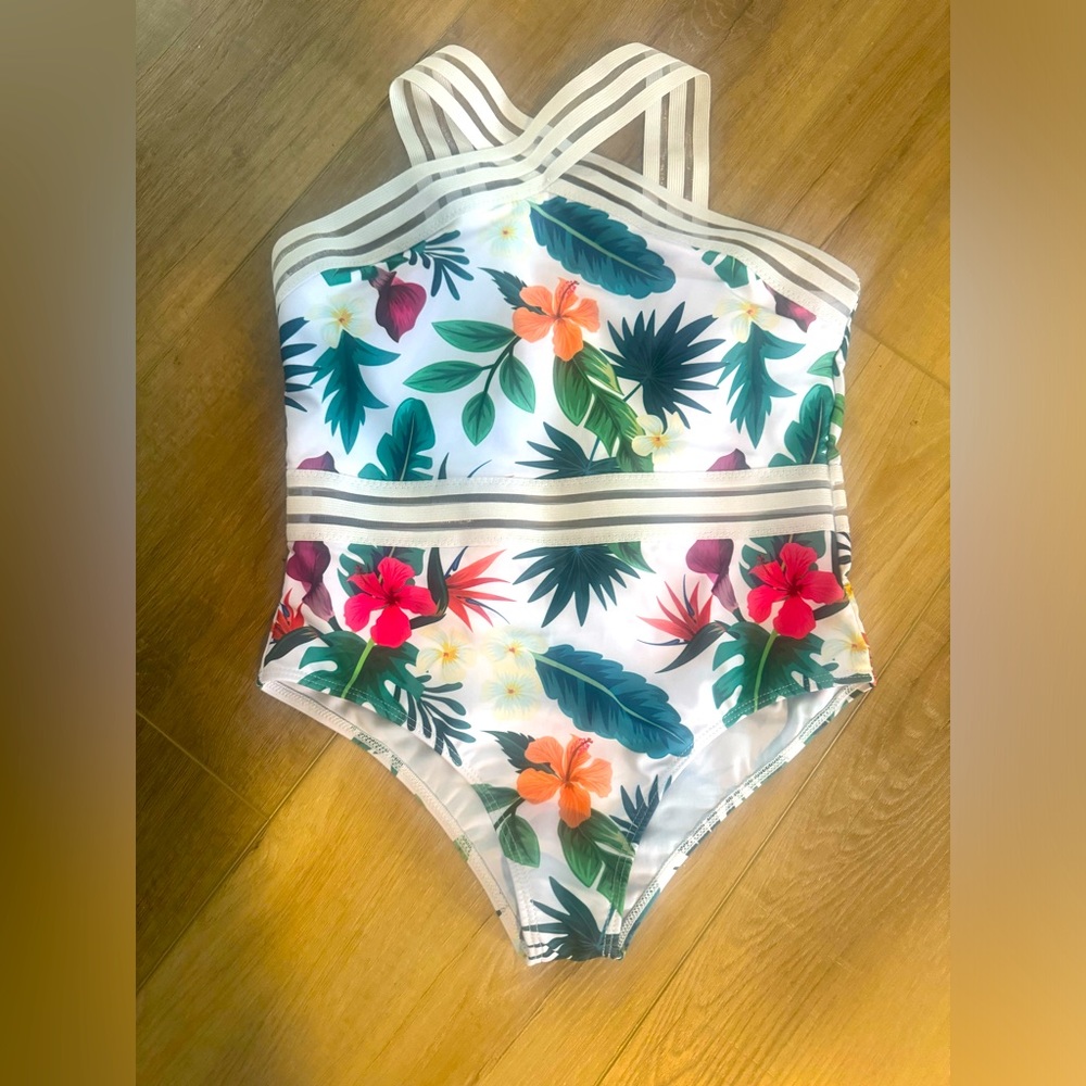 Girls brand new adorable bathing suit! Tropical print. Size 11-12 y/o.